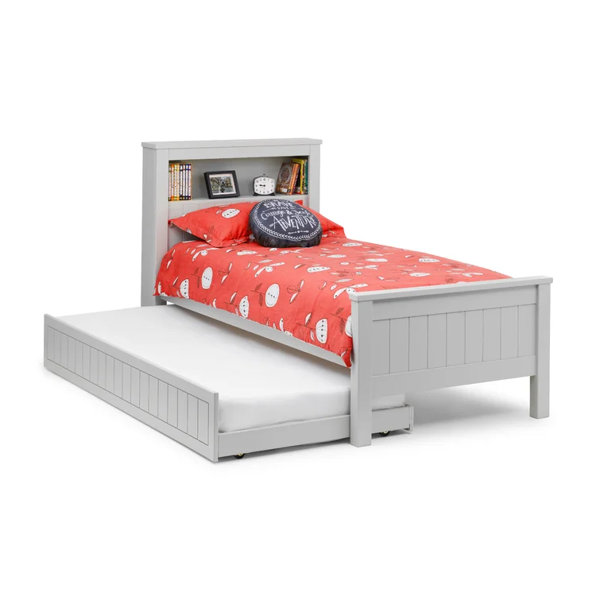 Single beds with pull store out bed under